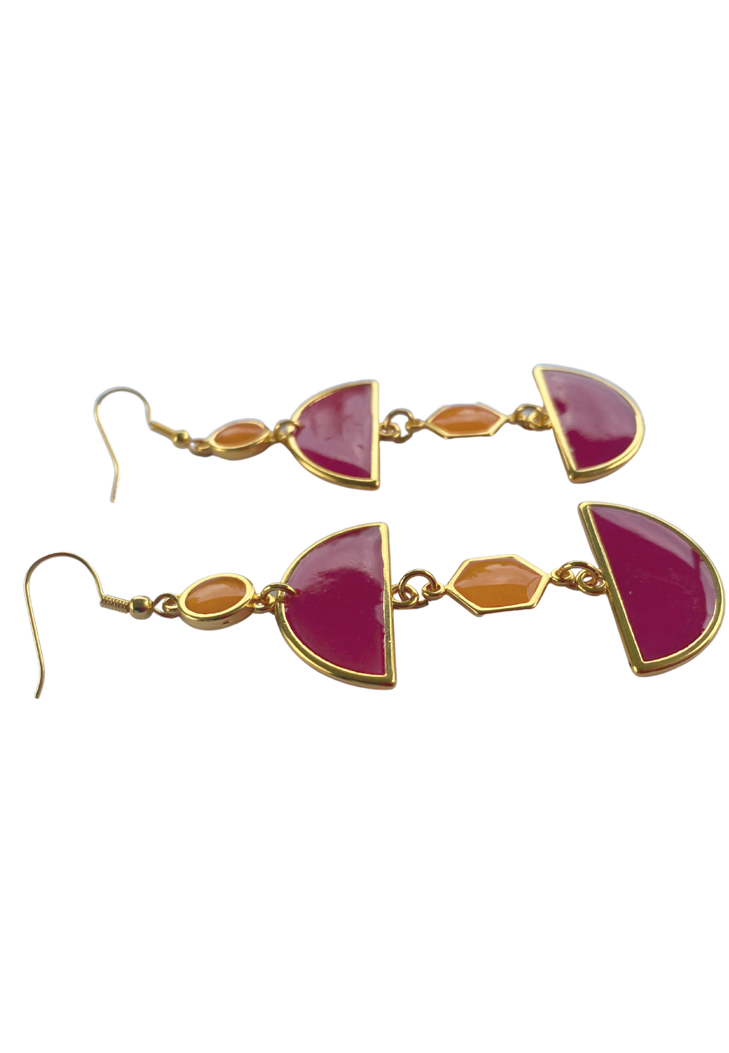 Goudkleurige sunset hangers met roze elementen