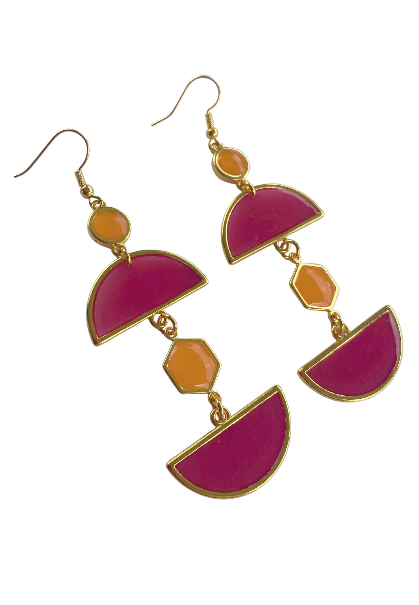 Goudkleurige sunset hangers met roze elementen